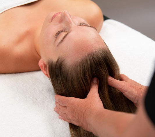 Head massage in a skin care clinic setting